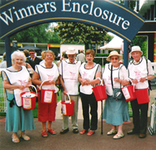 Collecting for Action for Children in the Winners' Enclosure at Windsor Race Course.
